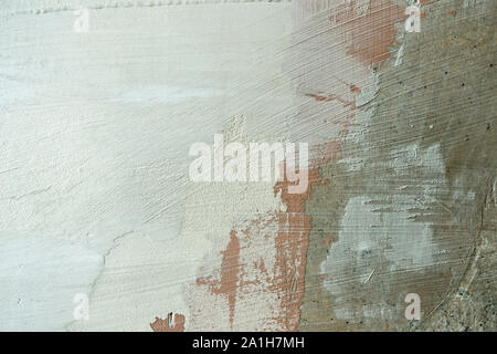 Old weathered plâtré peint mur intérieur avec nouvelle couche de stuc blanc texture background Banque D'Images