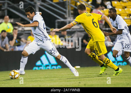 Columbus, Ohio, USA. 29 Septembre, 2019. Le milieu de l'Union de Philadelphie Ilsinho (25) gère la balle contre Columbus Crew milieu SC Wil Trapp (6) dans leur match à Mapfre Stadium. Credit : Brent Clark/Alamy Live News Banque D'Images