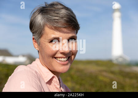 Woman relaxing on a beach Banque D'Images