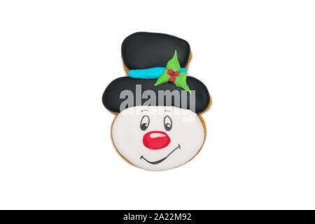Gingerbread cookie funny snowman dans un chapeau melon noir Banque D'Images