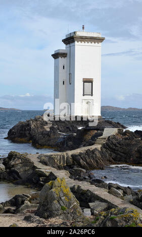 Le phare de Port Ellen sur la côte à Carraig Fhada sur l'île écossaise d'Islay. Banque D'Images