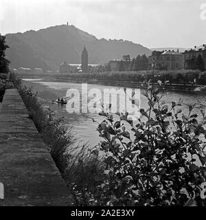 Blick auf die Kurstadt Bad Ems an der Lahn, Deutschland 1930 er Jahre. Vue de station thermale de Bad Ems et la rivière Lahn, Allemagne 1930. Banque D'Images