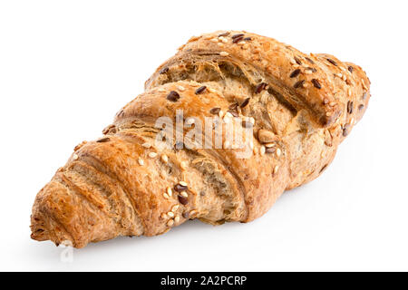 Croissant de blé entier avec linseeds et les graines de sésame isolé sur blanc. Banque D'Images