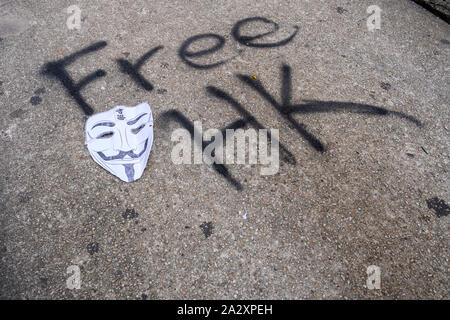 Le 2 octobre 2019. Hong Kong reprend l'entreprise matin après des manifestations violentes le 1 octobre 2019. Protester contre les graffitis sont trouvés sur l'île de Hong Kong après la Journée nationale de protestation. Banque D'Images