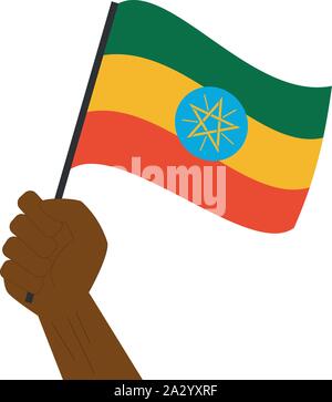 Main tenant et élever le drapeau national de l'Éthiopie Illustration de Vecteur