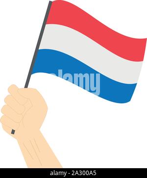 Main tenant et élever le drapeau national du Pays-Bas Illustration de Vecteur