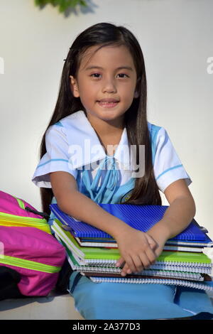 Happy Girl Student Wearing School Uniform Banque D'Images