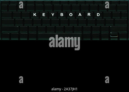 Le mot " clavier ' sur le calculateur vierge du clavier enfoncé dans l'obscurité. Vue de dessus et copiez l'espace pour le texte. Banque D'Images