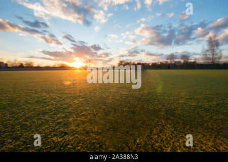 Terrain de sport au coucher du soleil. Banque D'Images