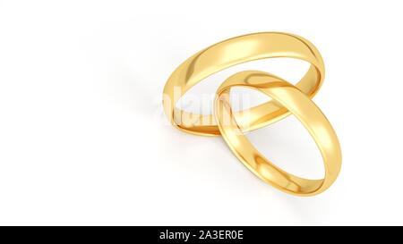 Anneaux de mariage d'or isolé sur fond blanc. Banque D'Images