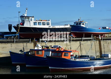 Bateaux du port et de la jetée de Seahouses, Northumberland Banque D'Images