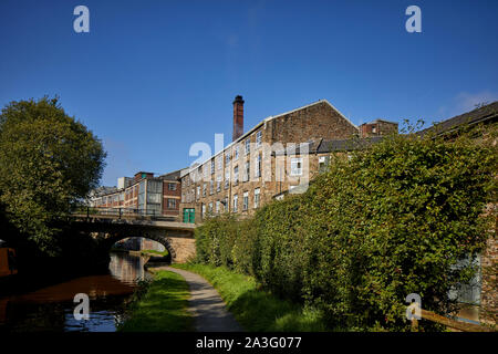 Les nouvelles usines dans le Derbyshire autrefois partie de Stockport Swizzles Sweet Factory, sur le canal des banques. Banque D'Images