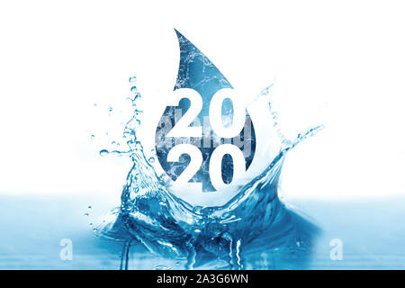 Nouvelle Année 2020 salutations dans la goutte d'eau et les éclaboussures Banque D'Images
