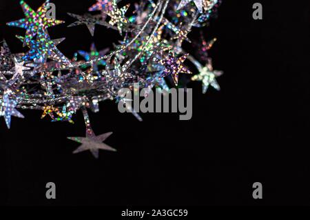 Décoration de Noël close up, glitter new year décoration sur un fond noir. Banque D'Images