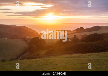 Coucher de soleil sur Hope Cove, Devon, Angleterre, Royaume-Uni. Banque D'Images