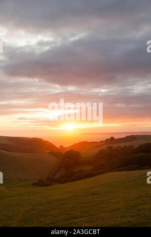 Coucher de soleil sur Hope Cove, Devon, Angleterre, Royaume-Uni. Banque D'Images
