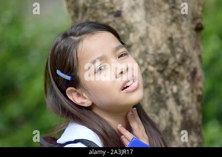 Une malheureuse Fille de l'école minoritaire Banque D'Images