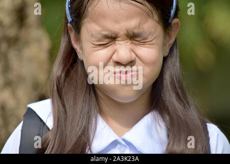 Jeune fille asiatique et de l'anxiété de l'enfant étudiant Banque D'Images