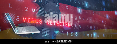 Composite image hacker using laptop Banque D'Images