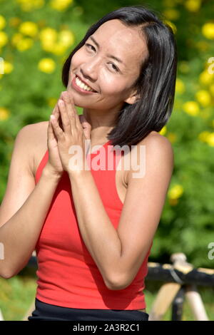 Femme priant divers Banque D'Images