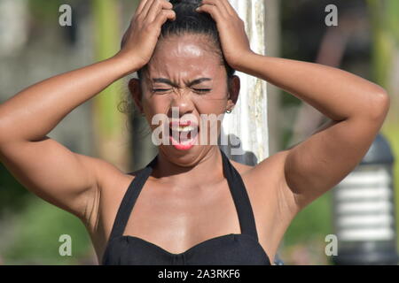 Femme Asiatique attrayant souligne Banque D'Images