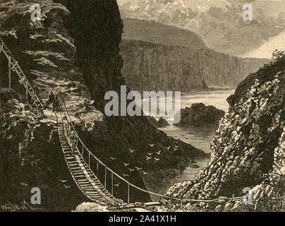 'Le Pont, Carrick-A-Rede', 1898. Carrick-a-Rede, près de Ballintoy dans le comté d'Antrim, en Irlande du Nord, relie le continent avec une île sur l'océan Atlantique. À partir de "notre propre pays, Volume V". [Cassell et Company, Limited, Londres, Paris &AMP ; Melbourne, 1898] Banque D'Images