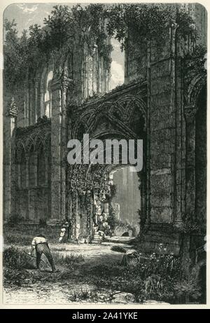 'Glastonbury Abbey', c1870. Glastonbury Abbey, reconstruit après un incendie en 1184 a été de 14e siècle l'un des monastères les plus riches et les plus puissants en Angleterre, associé à la légende du roi Arthur. L'abbaye a été supprimé pendant la dissolution des monastères sous le Roi Henry VIII et le dernier abbé, Richard Whiting a été pendu, écartelés comme un traître sur Tor de Glastonbury en 1539. À partir de "l'Europe pittoresque - Les îles Britanniques, Tome I". [Cassell, Petter &AMP ; Galpin, Londres, c1870] Banque D'Images