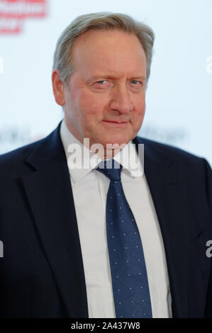 Cologne, Allemagne. Oct 11, 2019. L'Acteur Neil Dudgeon vient à un examen préalable du premier épisode de la 21e saison de la série 'crime Inspecteur Barneby" dans le cadre du Festival du film 2019 de Cologne. Credit : Henning Kaiser/dpa/Alamy Live News Banque D'Images