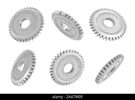 Le rendu 3D de plusieurs engrenages métalliques suspendus dans différents angles sur un fond blanc. Les pièces mécaniques. Les pièces internes de l'équipement. Le changement de vitesse Banque D'Images