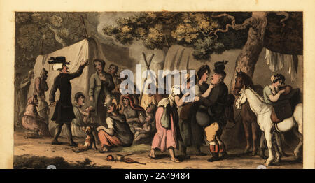 Regency parson dans un camp de Roms. Deux femmes lire un homme's palm tandis qu'un autre vole de ses bagages. Un groupe de voyageurs roms s'asseoir autour d'un feu à l'extérieur des tentes dans un bois. Le Dr syntaxe et la gitans. La gravure sur cuivre coloriée dessiné et gravé par Thomas ROWLANDSON de William Combe's la visite du médecin à la recherche de la syntaxe de consolation, Rudolph Ackermann, Londres, 1820. Banque D'Images