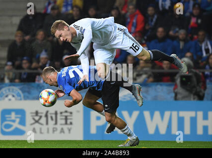 Tallinn, Estonie. 13 Oct, 2019. Nikita Baranov (Estonie) et Marcel Halstenberg (Allemagne). GES/football/Qualification EURO : l'Estonie - Allemagne, 13.10.2019 Football/soccer : Estonie : qualificatifs contre l'Allemagne, Tallinn, 13 octobre 2019 dans le monde de l'utilisation | Credit : dpa/Alamy Live News Banque D'Images