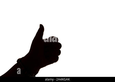 Une seule main gauche en silhouette sur un fond blanc le pouce geste vers le haut Banque D'Images