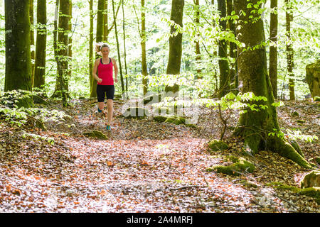 Woman jogging Banque D'Images
