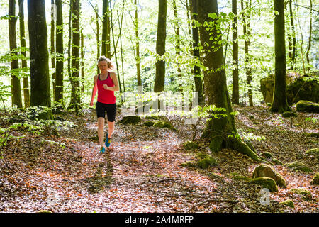 Woman jogging Banque D'Images
