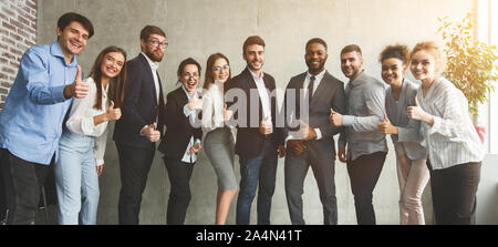 Heureux composite showing Thumbs up Banque D'Images