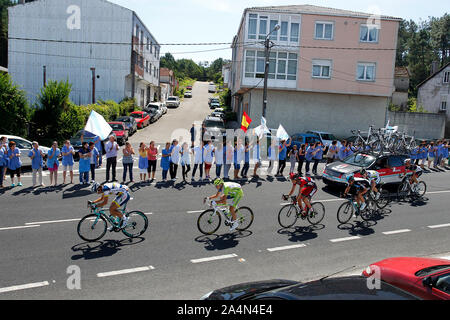 Thomas De Gendt (Vacansolei), Linus Gerdemann (RadioShack-Nisan), Elia Viviani (Liquigas-Cannondale), Simon Clarke et Cameron Meyer (Orica-GreenEdge) Banque D'Images