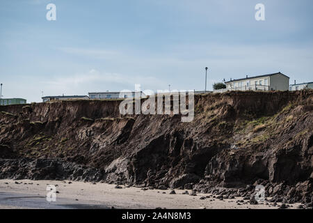 Hornsea sur le littoral Holderness, l'un des littoraux les plus rapides d'éroder, montrant des exemples de l'érosion côtière. Banque D'Images