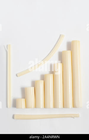 Un diagramme en bâtonnets de fromage pelable isolated Banque D'Images