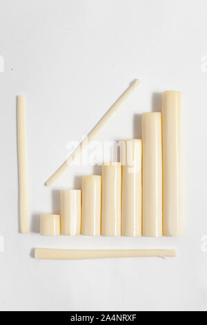 Un diagramme en bâtonnets de fromage pelable isolated Banque D'Images
