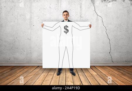 Businessman holding big white poster avec tirées d'ossature et le symbole du dollar sur sa poitrine Banque D'Images