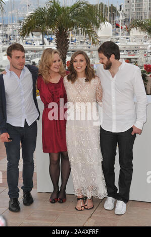 CANNES, FRANCE. 16 mai 2011 : : Brady Corbet LtoR & Louisa Krause & Elizabeth Olsen & directeur Sean Durkin au photocall pour leur film 'Martha Marcy Marlene mai' au 64e Festival de Cannes. © 2011 Paul Smith / Featureflash Banque D'Images