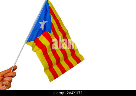 Drapeau de la Catalogne s'est tenue sur le fond blanc Banque D'Images