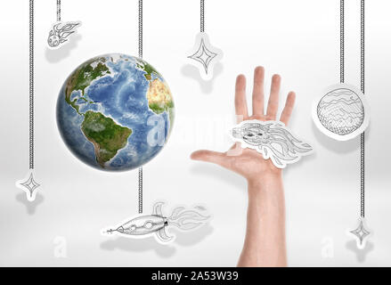 La terre sur fond de petites images avec des étoiles et des hommes de main Banque D'Images