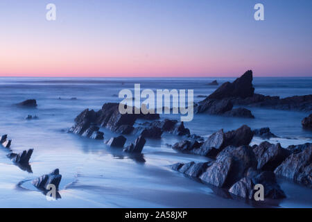 Coucher du soleil dans la plage de Barrika, Pays Basque Banque D'Images