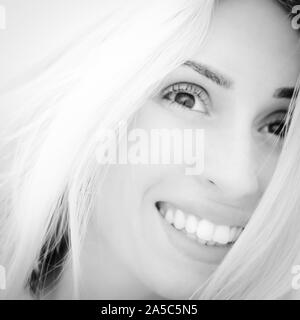 Portrait of a cute smiling young girl close-up face, photo nb. Banque D'Images