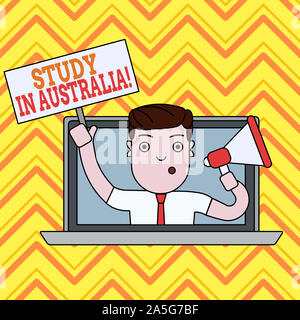 La main conceptuel montrant étudier en Australie. Allant dans le sens du concept de pays étrangers pour compléter vos études par l'ordinateur portable parlant de l'Homme Banque D'Images