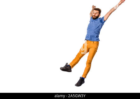 Disco Dancer montrant certains mouvements isolés contre fond blanc Banque D'Images