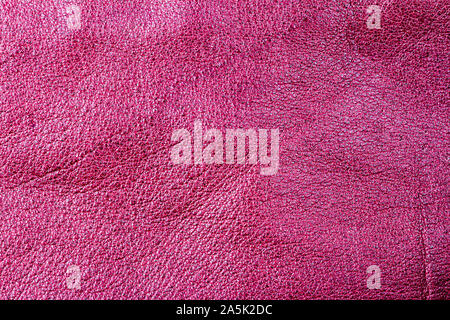 Cuir rouge froissé texture background. Résumé La texture de cuir. Banque D'Images