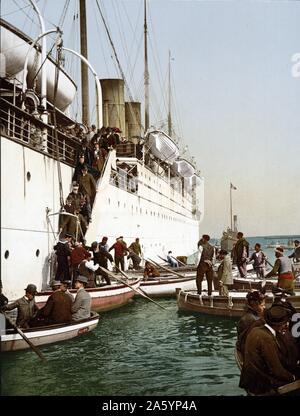 Débarquant d'un navire, Alger, Algérie, 1899. Banque D'Images