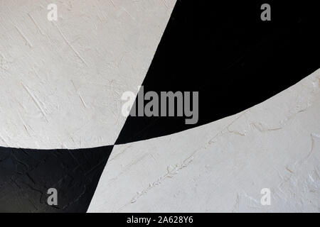 Géométriques multicolores peint noir et blanc vieux wall background Banque D'Images